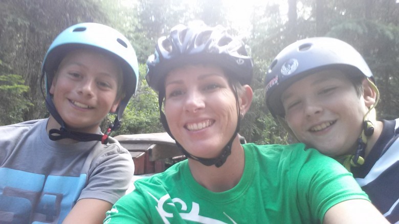 Christine and her family on a ride