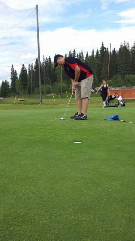 Dan playing golf