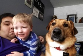 Dad, boy and dog