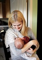 Woman holding a baby