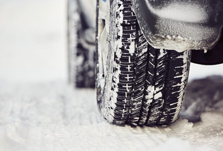 Detail of the tire on winter road