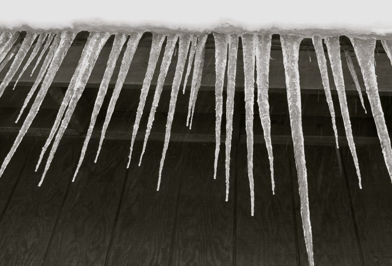 Icicles hanging from a roof