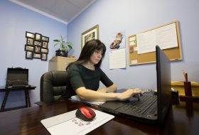 Accountant working in business she owns