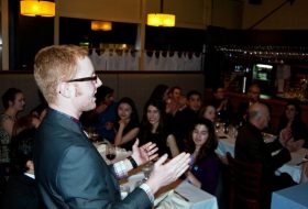 Man speaking to a crowd