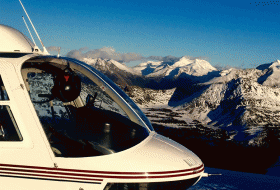 Helicopter landing on a mountain