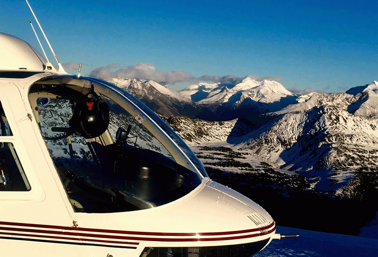 Helicopter landing on a mountain