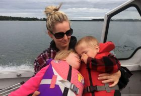 Mom with kids on boat