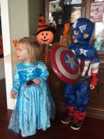 Alexandra's kids in Halloween costumes