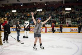 Bryce on the ice at a Cougars hockey game