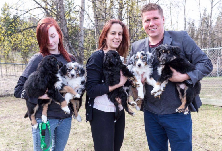 Joe with SPCA staff and five dogs