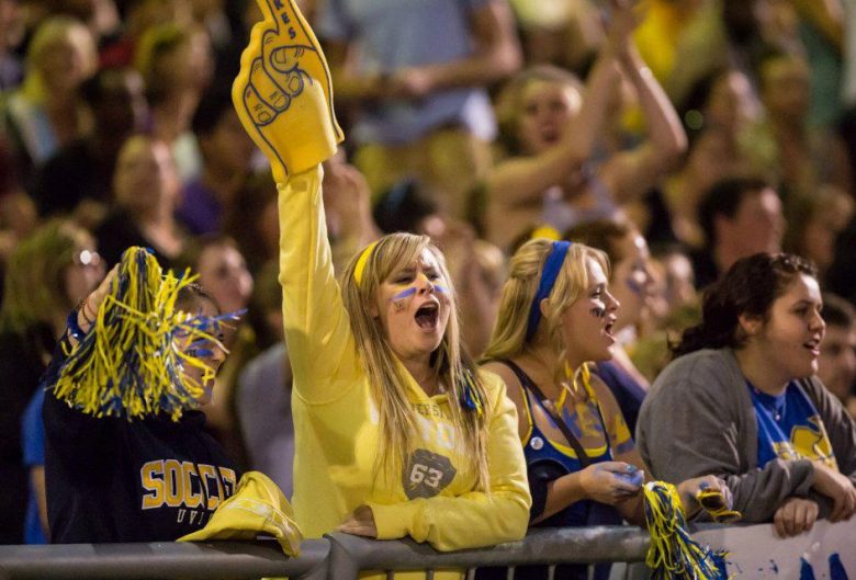 Stephanie cheering at a soccer game