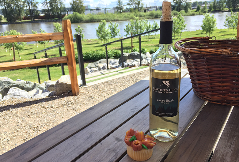 Wine and a cupcake on a table