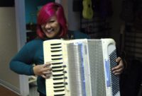 woman playing accordion