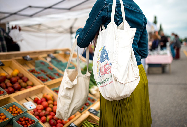 woman shopping at Farmers' Market