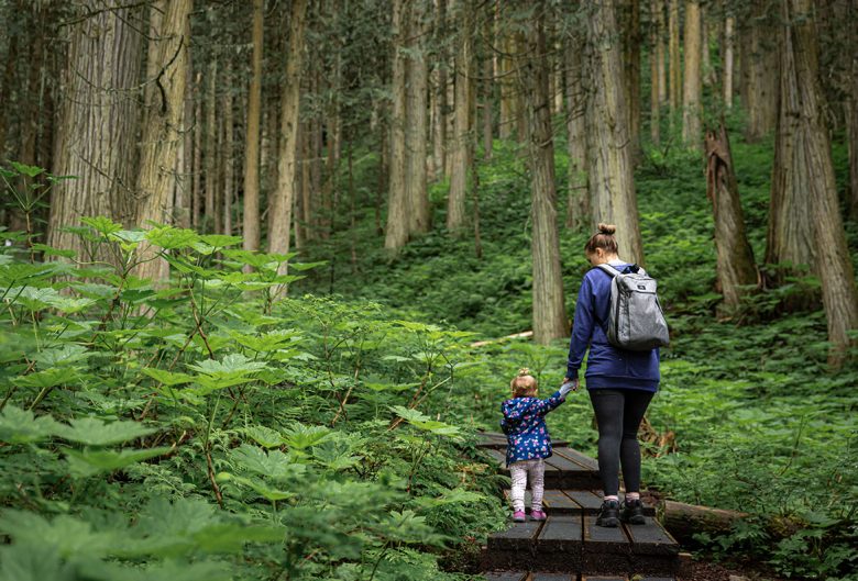 Mom and daughter hiking at the Ancient Forest.