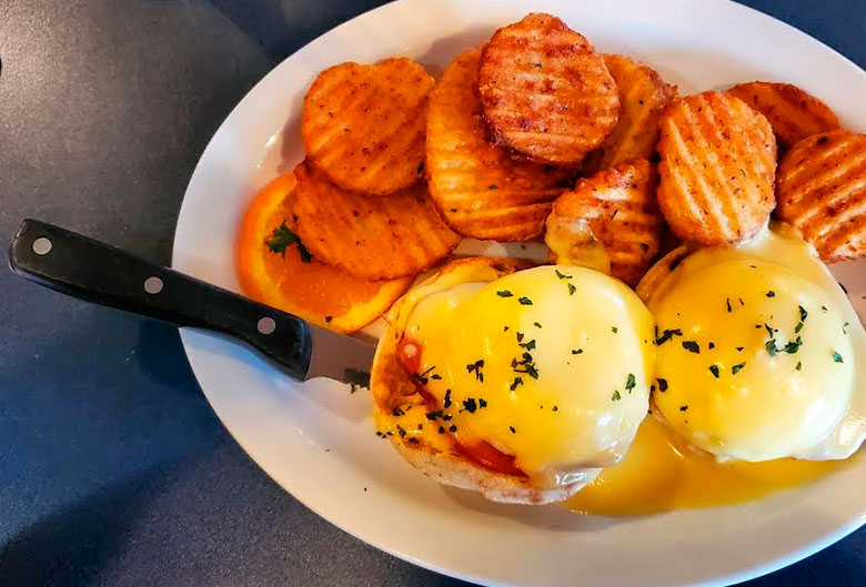 Yolks eggs benedict and hashbrowns