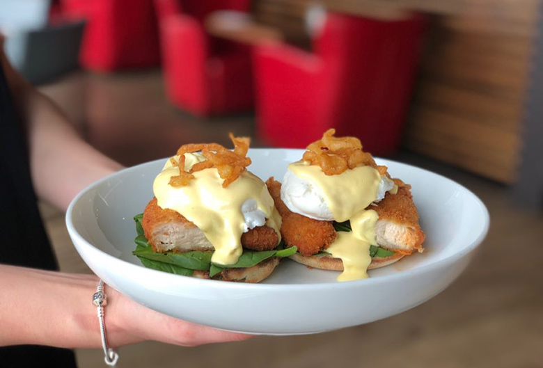 Eggs bennies with fried chicken.