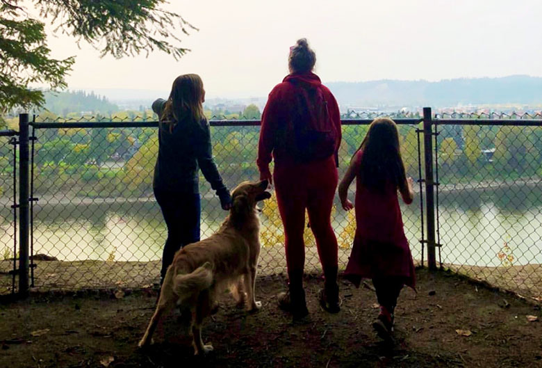 People at LC Gunn Park overlooking Fraser River.