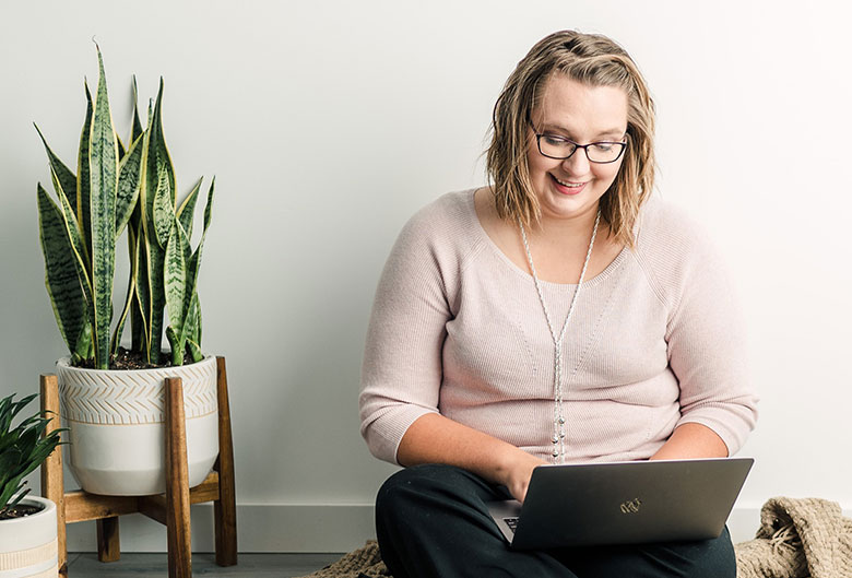 Woman on computer.