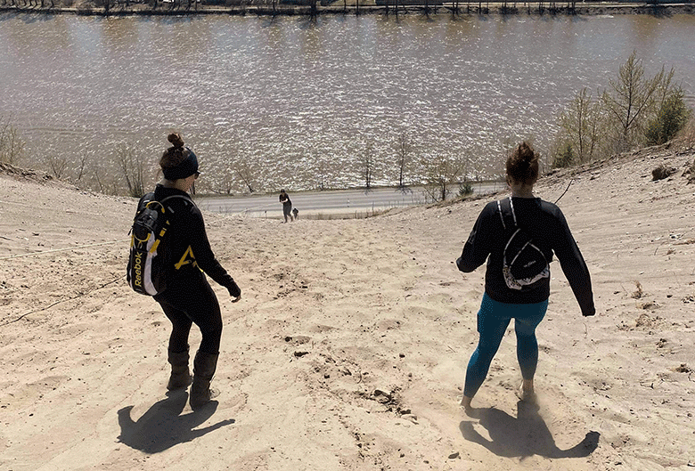 Women climbing down the cutbanks