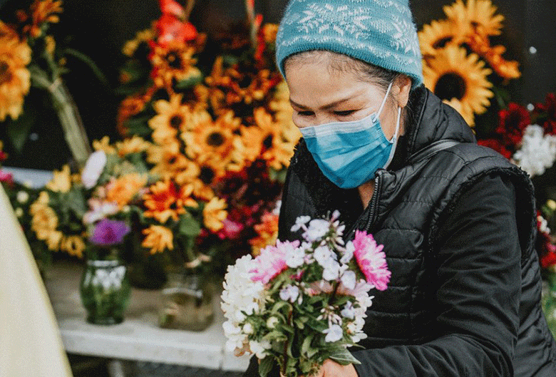 woman holding flowers