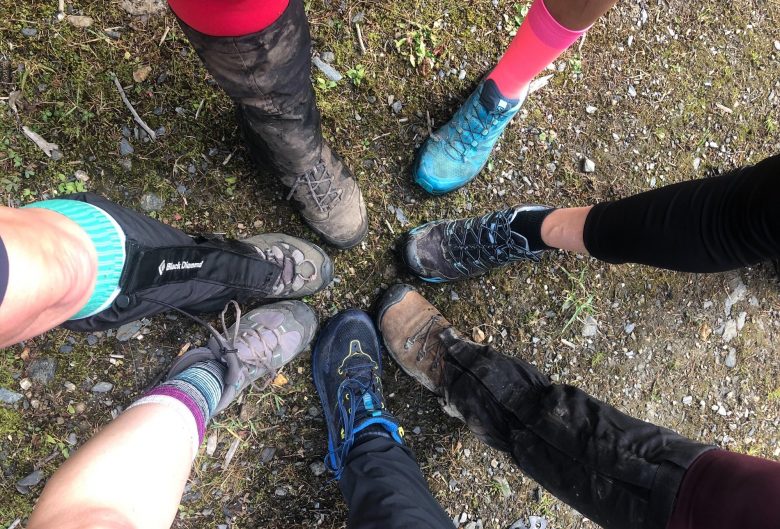 Circle of feet in hiking boots